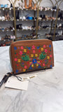 Brown clutch with colorful floral embroidery